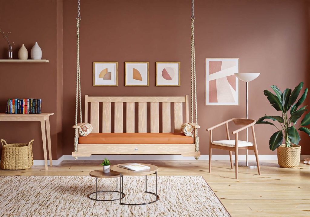 A handcrafted porch swing used indoors